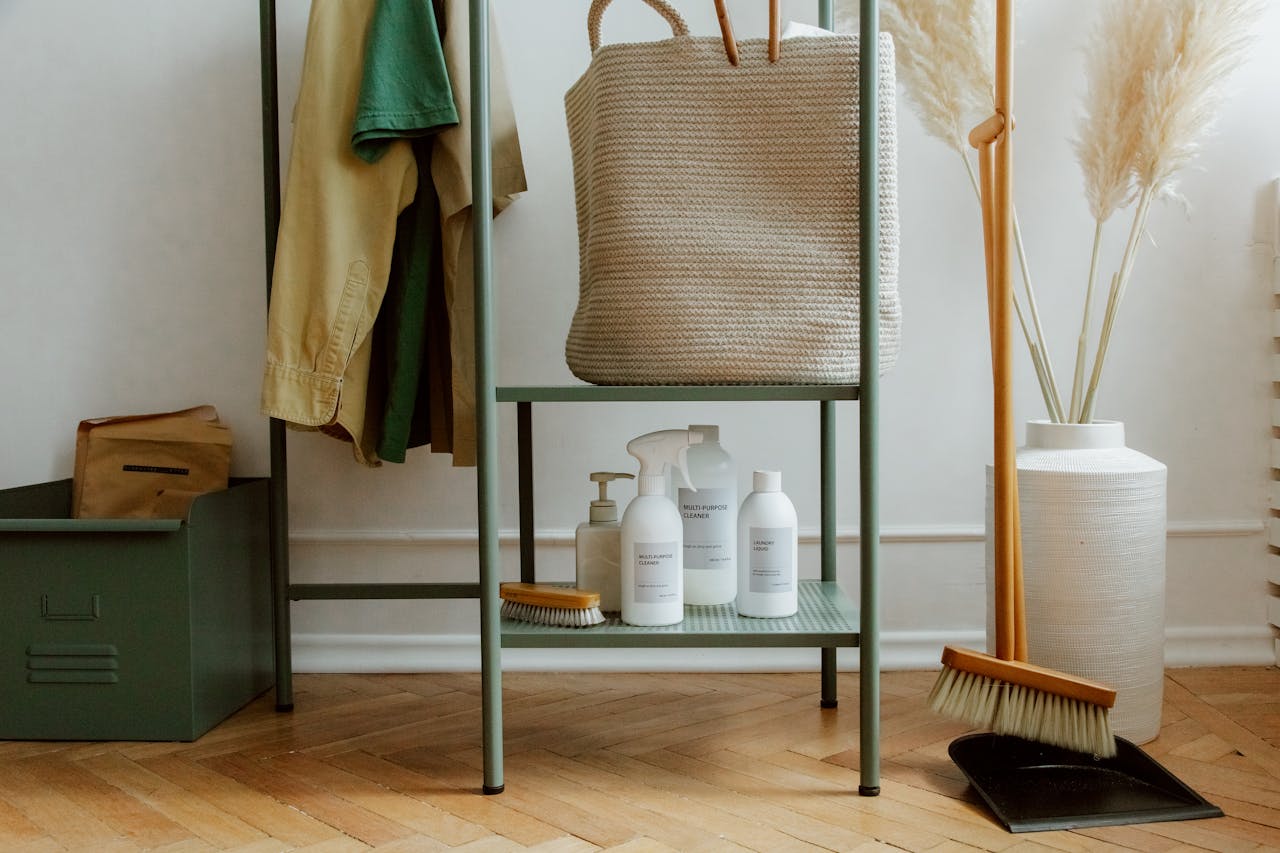 Eco-friendly cleaning products and home storage solutions in a modern, minimalist interior.